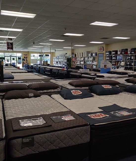 Rows of mattresses in The Sleep Center showroom